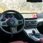 2023 BMW i4 sedan EV review engine design interior